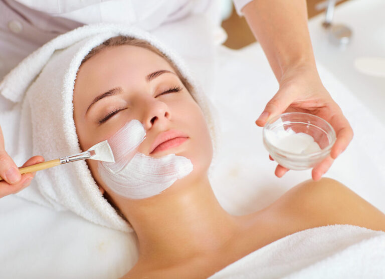 Woman in mask on face in spa beauty salon